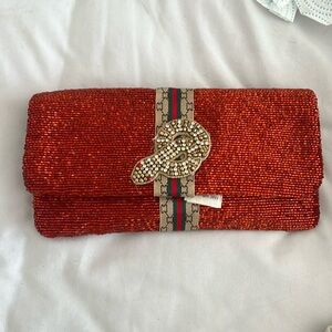 Burnt orange beaded purse